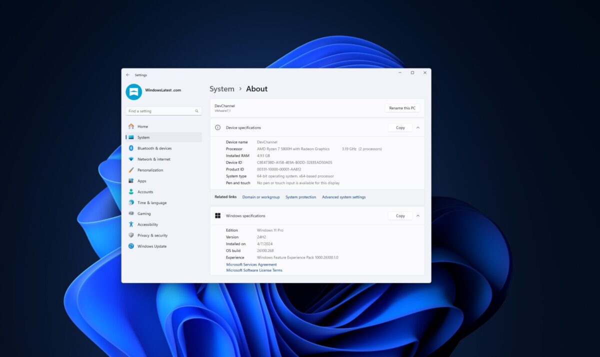 نمای کامل از بخش System About در تنظیمات ویندوز ۱۱ با نام دستگاه DevChannel، پردازنده AMD Ryzen 7 5800H، مقدار ۴.۹۳ گیگابایت رم و نسخهی Windows 11 Pro 24H2 با بیلد سیستمعامل 26100.268 روی پسزمینه پیشفرض ویندوز.