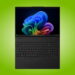لپتاپ مشکی Lenovo ThinkPad L16 Gen 3 باز روی پسزمینه سبز درخشان با نمایشگر ویندوز ۱۱، کیبورد کامل و ترکپوینت قرمز