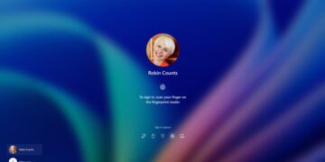 صفحه ورود سیستمعامل ویندوز با تصویر پروفایل کاربر که درخواست اسکن اثر انگشت (Windows Hello) برای لاگین را نمایش میدهد.