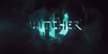 لوگوی The Witcher درخشان با رنگ فیروزهای روی Witcher درخشان با رنگ فیروزهای روی پسزمینهای تاریک نور آبی.
