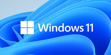 لوگوی Windows 11 روی پسزمینهای آبی با موجهای انتزاعی ویندوز.