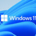 لوگوی Windows 11 روی پس‌زمینه‌ای آبی با موج‌های انتزاعی ویندوز.