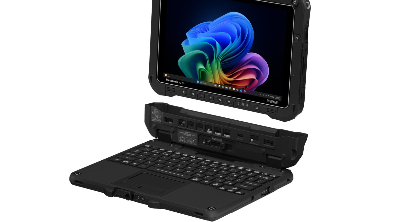 نمای سهبعدی و نیمهزاویهدار از تبلت مقاوم صنعتی Panasonic FZ-G3 که بالای داک کیبورد مشکی با پورتها و پینهای اتصال معلق شده و نمایشگر روشن آن با رابط کاربری ویندوز ۱۱ روی پسزمینه مشکی دیده میشود.