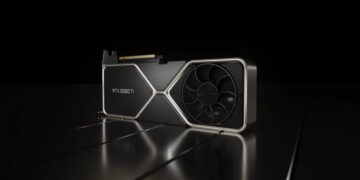 کارت گرافیک NVIDIA RTX 3080 Ti Engineering Sample بهصورت سهربعنما روی سطحی براق و تیره قرار گرفته و بازتاب نور روی آن دیده میشود.