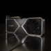 کارت گرافیک NVIDIA RTX 3080 Ti Engineering Sample به‌صورت سه‌ربع‌نما روی سطحی براق و تیره قرار گرفته و بازتاب نور روی آن دیده می‌شود.