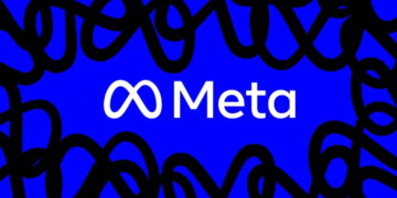 لوگوی سفید Meta در مرکز پس‌زمینه آبی روشن، با نقش‌های سیاه درهم‌تنیده در حاشیه‌ها.